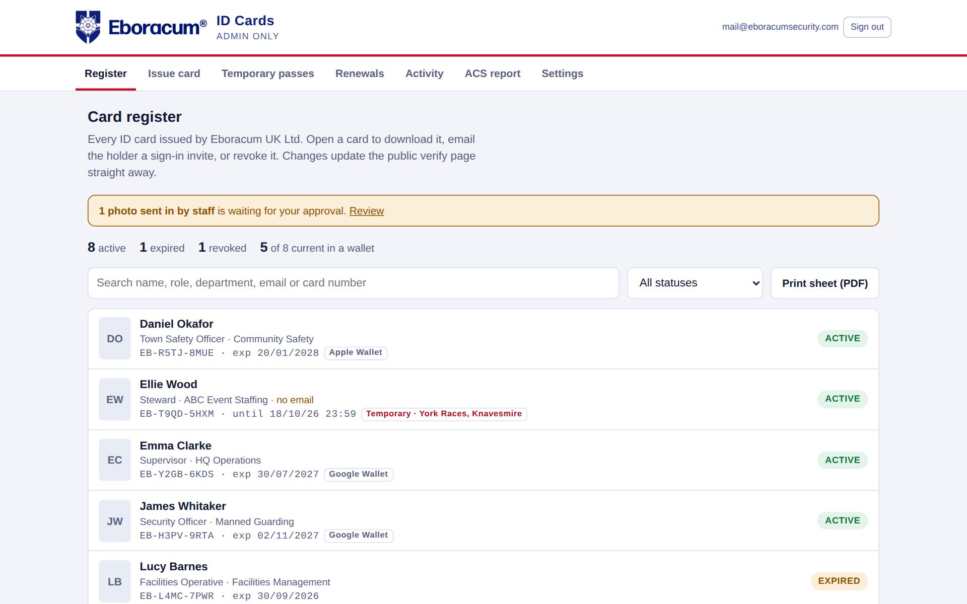 Card register on desktop with status pills and wallet tags